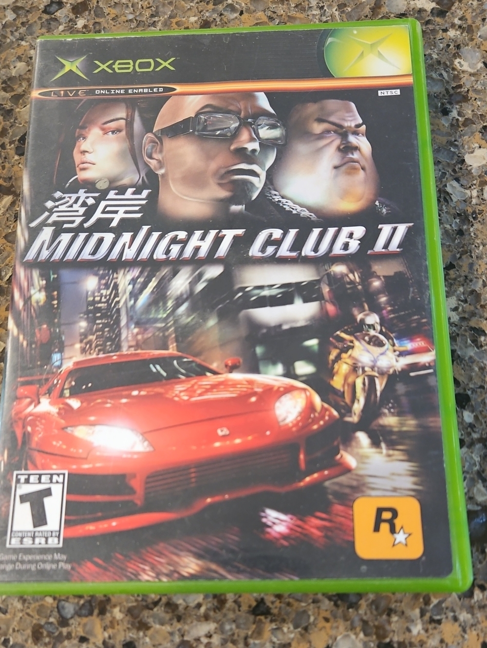 Xbox Midnight Club II -used. Includes Info Book